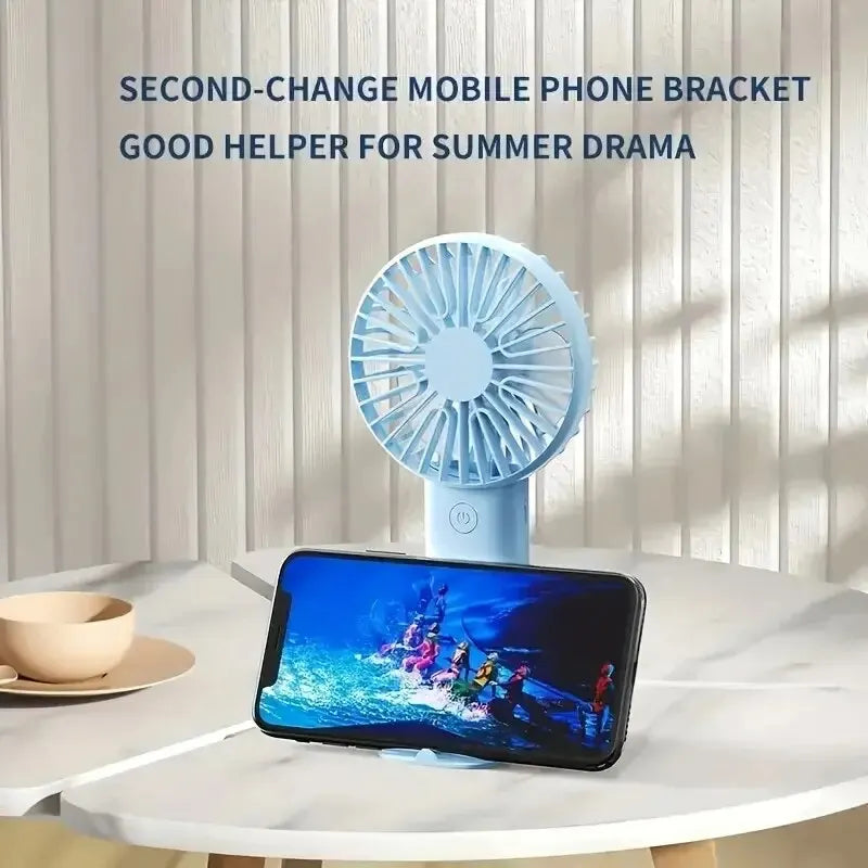 Mini USB charging fan with mobile phone holder